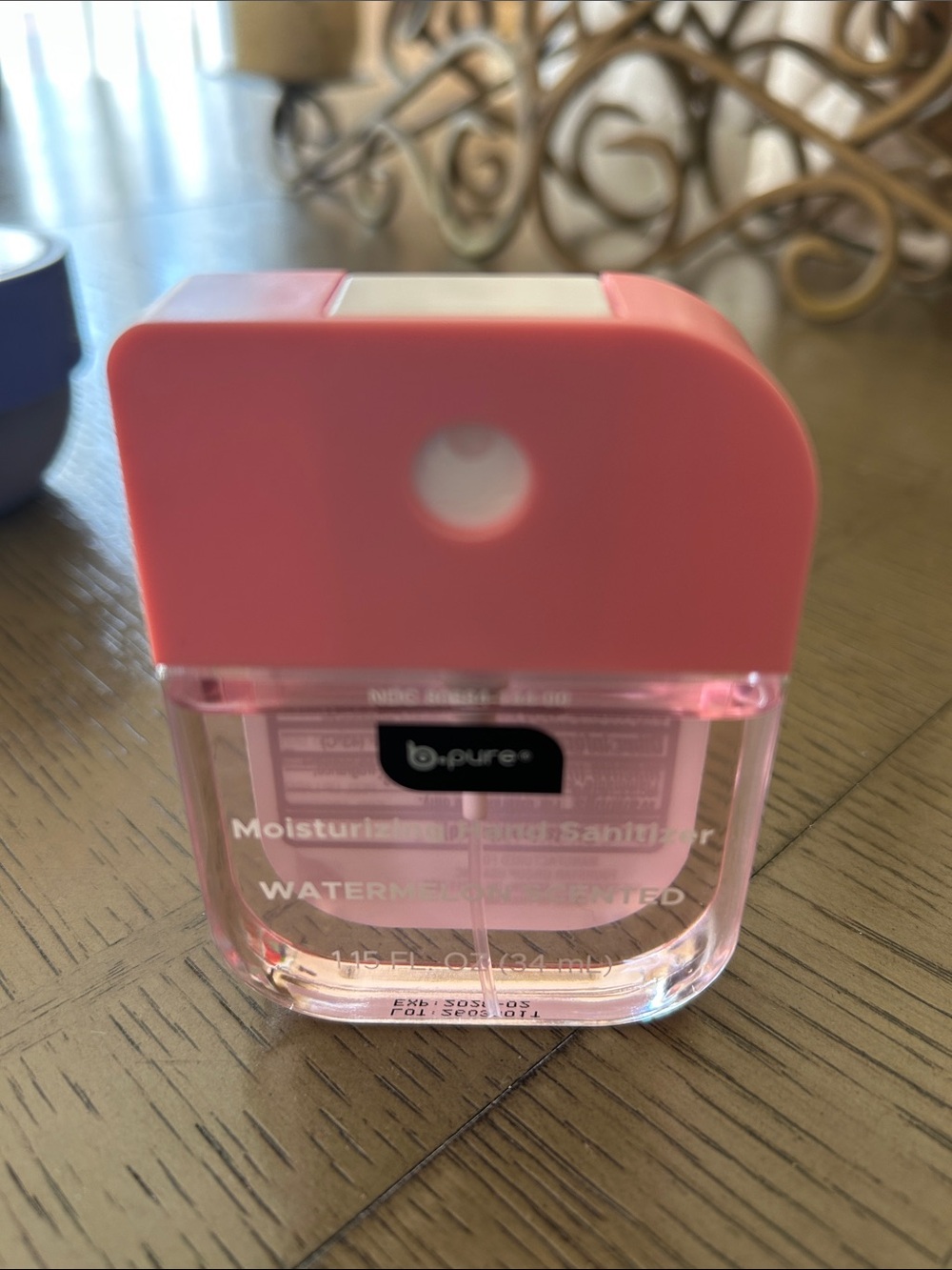 B. Pure Moisturizing Hand Sanitizer Cucumber Mint and Watermelon scented.